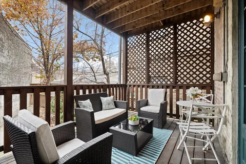 a view of a chairs in wooden deck