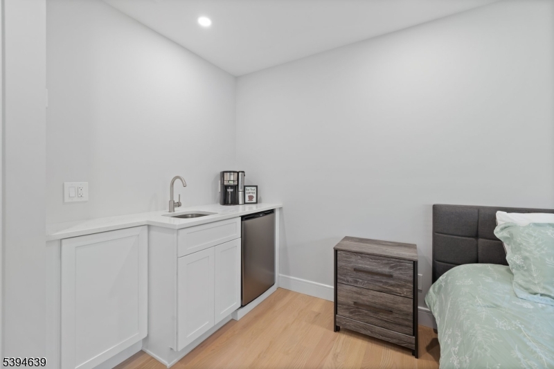 574 Ridgedale Avenue East Hanover, NJ 07936 - Photo 16 of 35 a room with a sink and a vanity