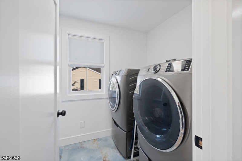 574 Ridgedale Avenue East Hanover, NJ 07936 - Photo 29 of 35 a utility room with dryer and washer