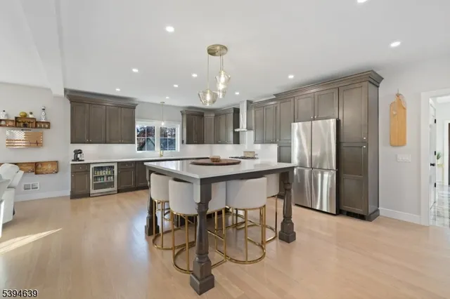 a kitchen with a table and chairs in it