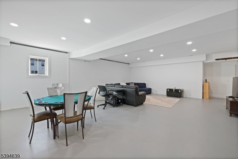 574 Ridgedale Avenue East Hanover, NJ 07936 - Photo 31 of 35 a living room with furniture and a large window
