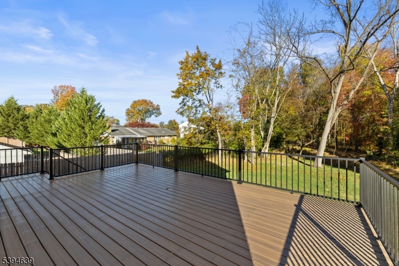 574 Ridgedale Avenue East Hanover, NJ 07936 - Photo 33 of 35 a view of a balcony with wooden floor