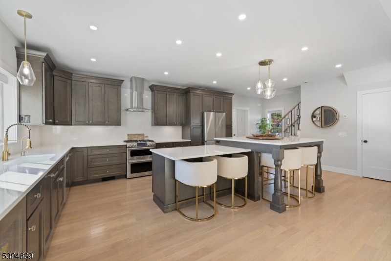 574 Ridgedale Avenue East Hanover, NJ 07936 - Photo 4 of 35 a kitchen with a table and chairs in it