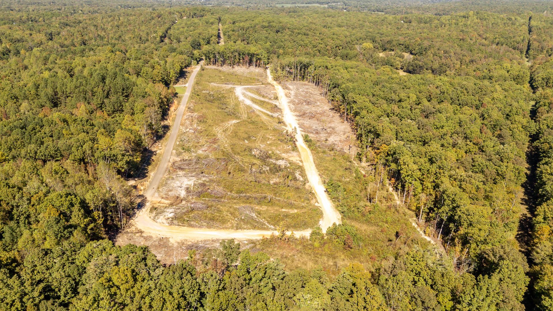 a view of residential houses with swimming pool