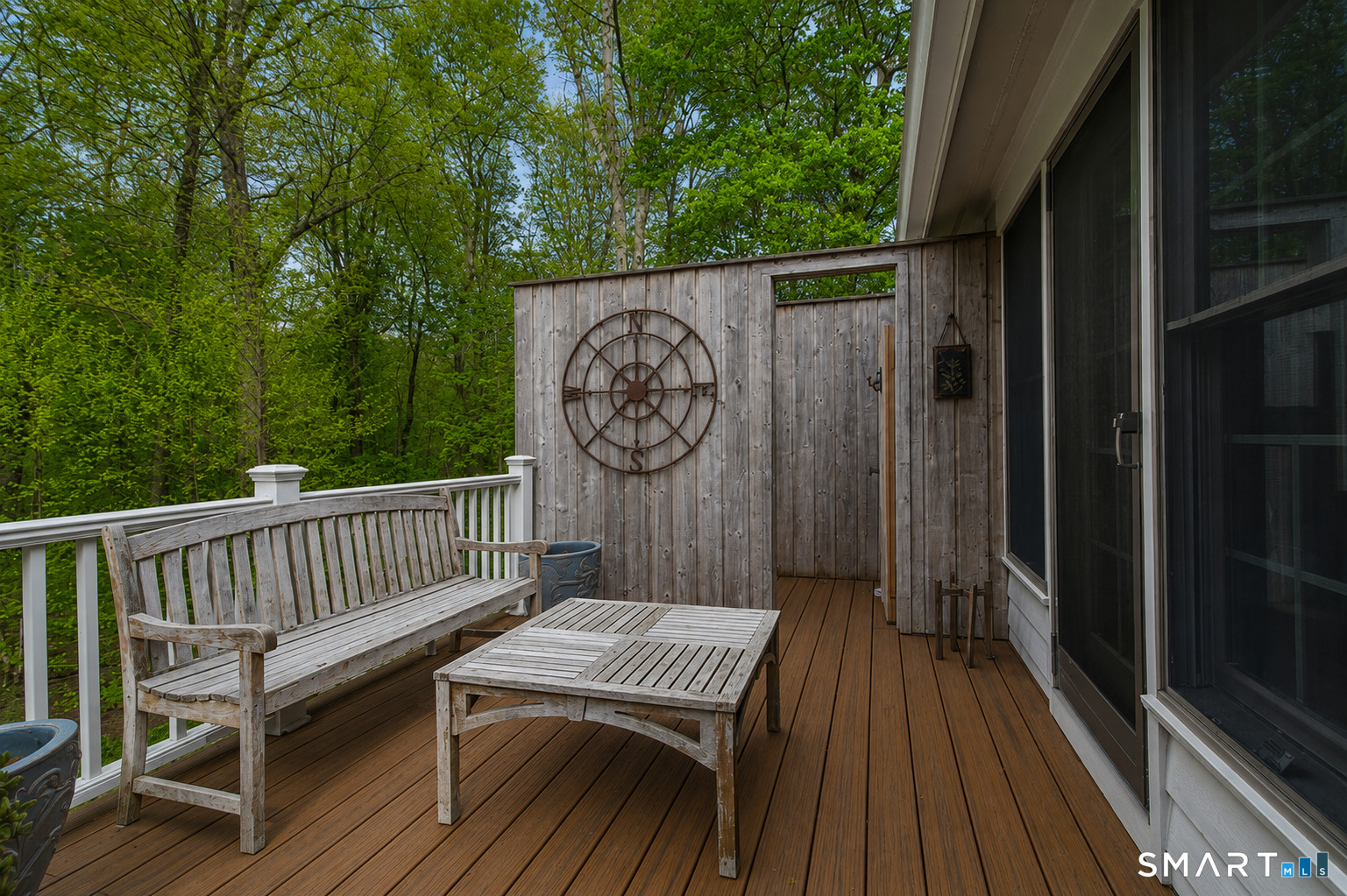9 Green Lane Ridgefield, CT 06877 - Photo 33 of 40 a view of balcony with wooden floor and outdoor seating