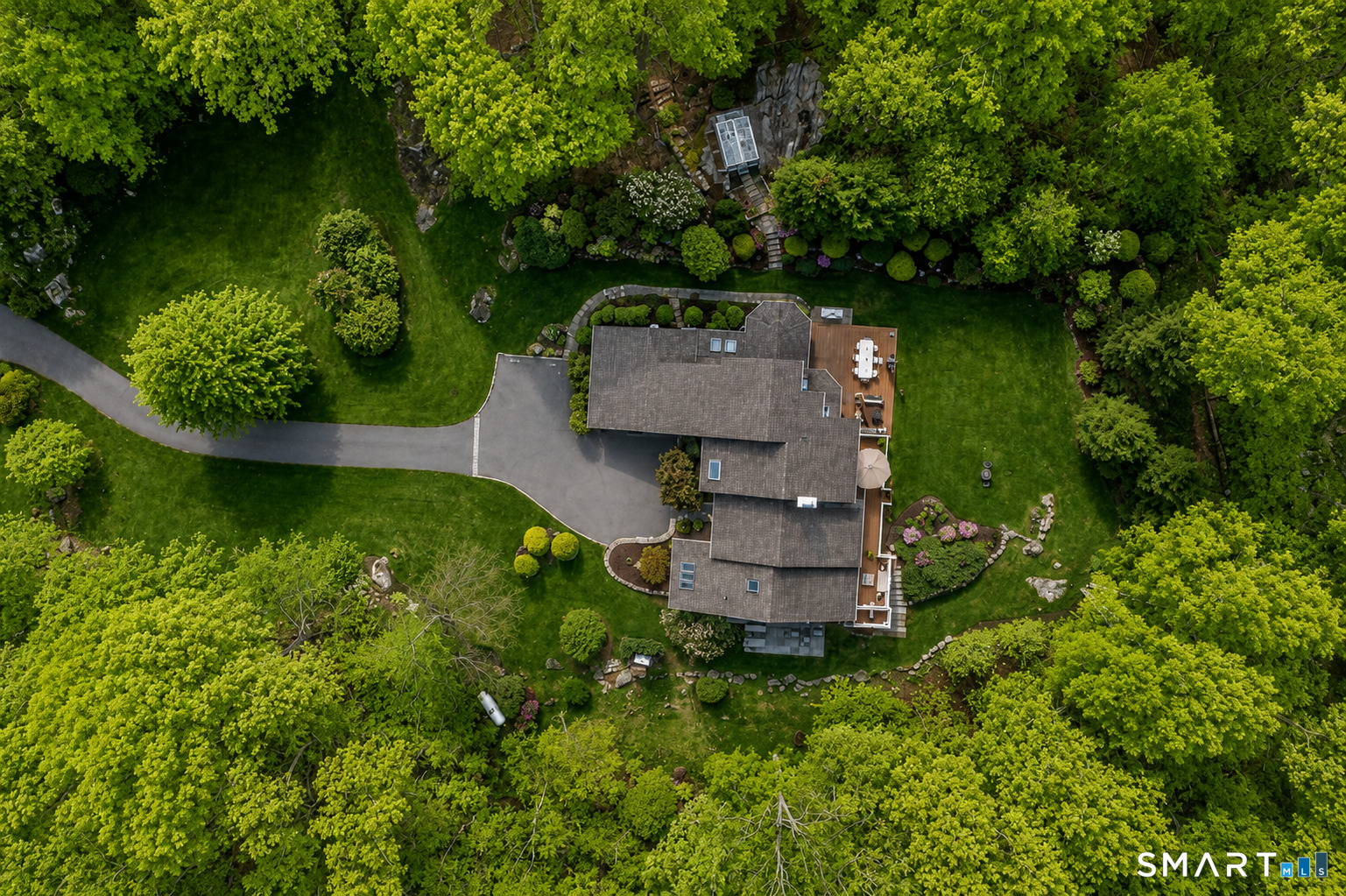 9 Green Lane Ridgefield, CT 06877 - Photo 36 of 40 an aerial view of a house with a yard