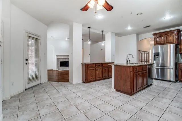 a kitchen with stainless steel appliances a sink and counter top