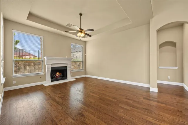 a spacious bedroom with a large bed and a couch
