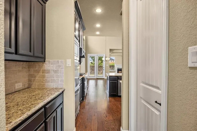 a view of a kitchen cabinets and a counter place
