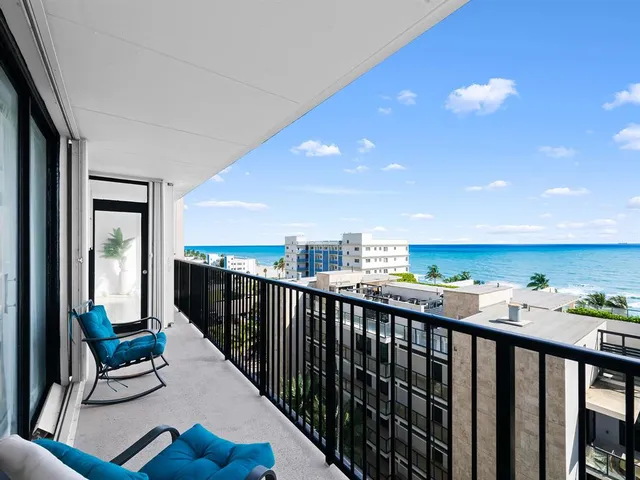 a view of a city with ocean