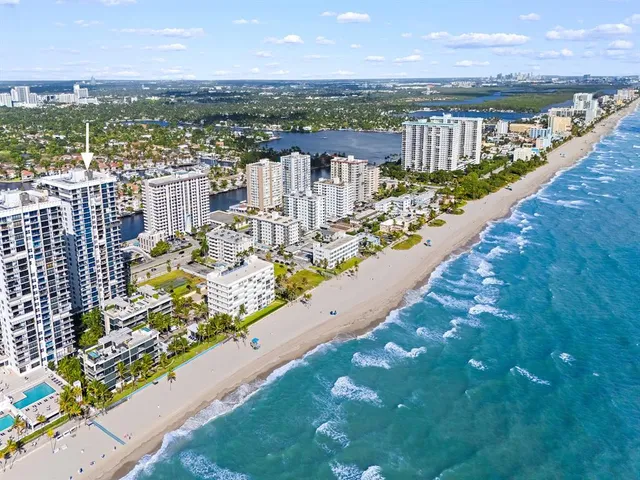a view of a backyard with sitting area