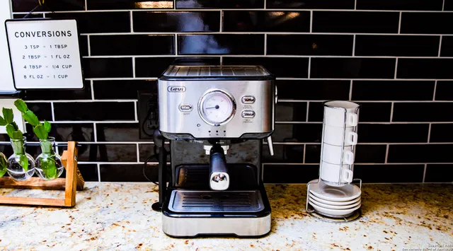 a living room with couch and window