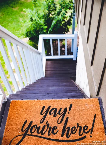 a room with table and chairs