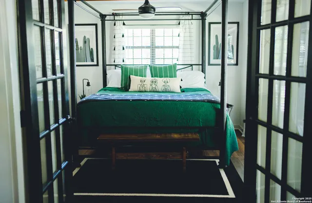 a view of a back yard with an outdoor space