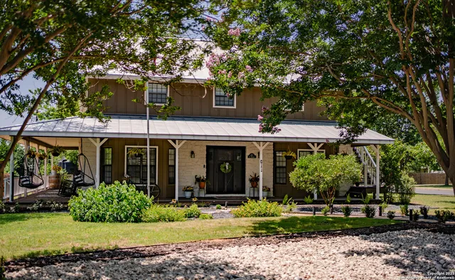 a view of a house with a garden