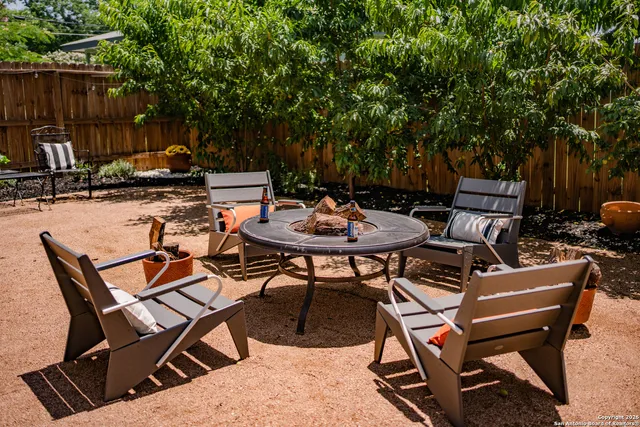 a view of a play room with a green field