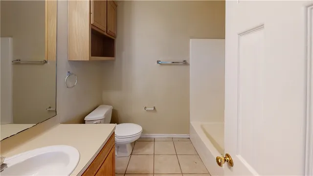 a bathroom with a sink and toilet