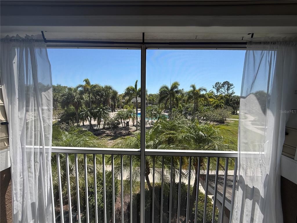 8932 Manor Loop, Unit 205 Lakewood Ranch, FL 34202 - Photo 8 of 15 a view of a balcony with a pot