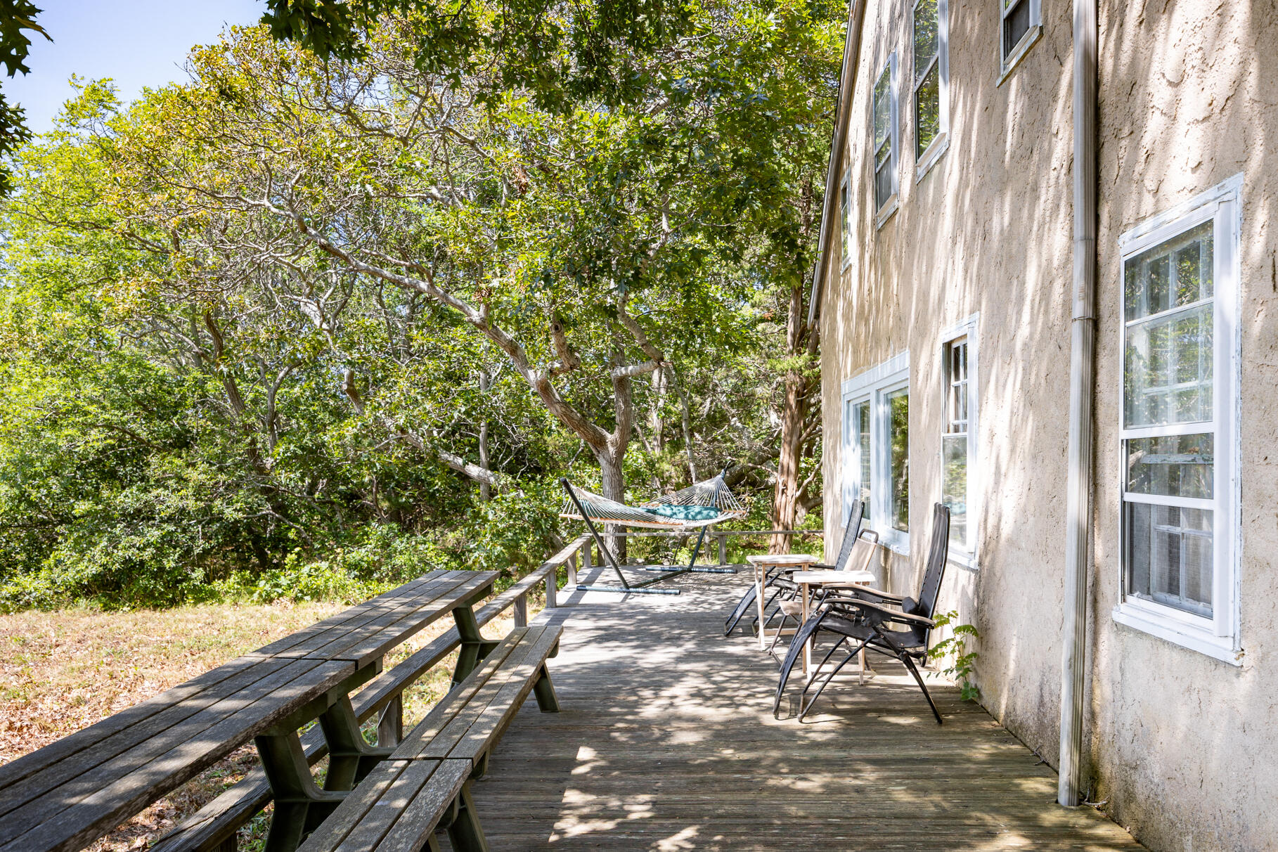 10 Cartway South Eastham, MA 02642 - Photo 11 of 52 a view of a bench in the balcony