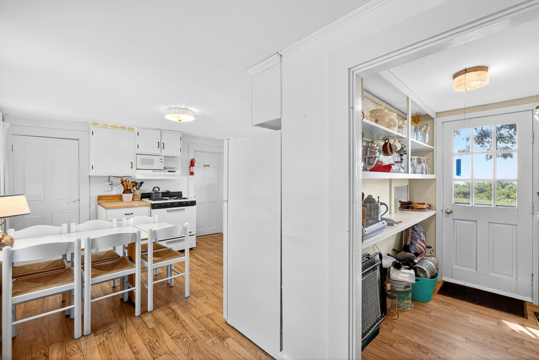 10 Cartway South Eastham, MA 02642 - Photo 16 of 52 a kitchen with stainless steel appliances kitchen island granite countertop a refrigerator and cabinets