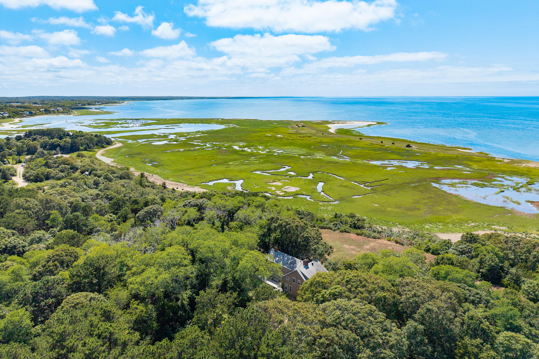 10 Cartway South Eastham, MA 02642 - Photo 5 of 52 a view of an ocean and beach
