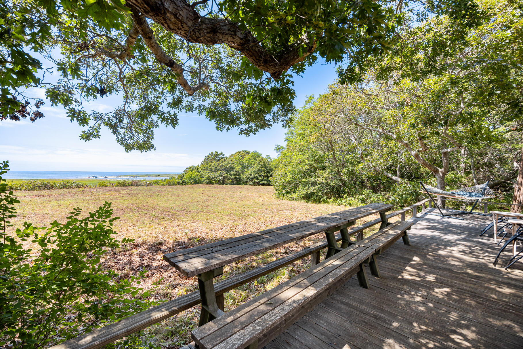 10 Cartway South Eastham, MA 02642 - Photo 7 of 52 a view of a terrace with chairs