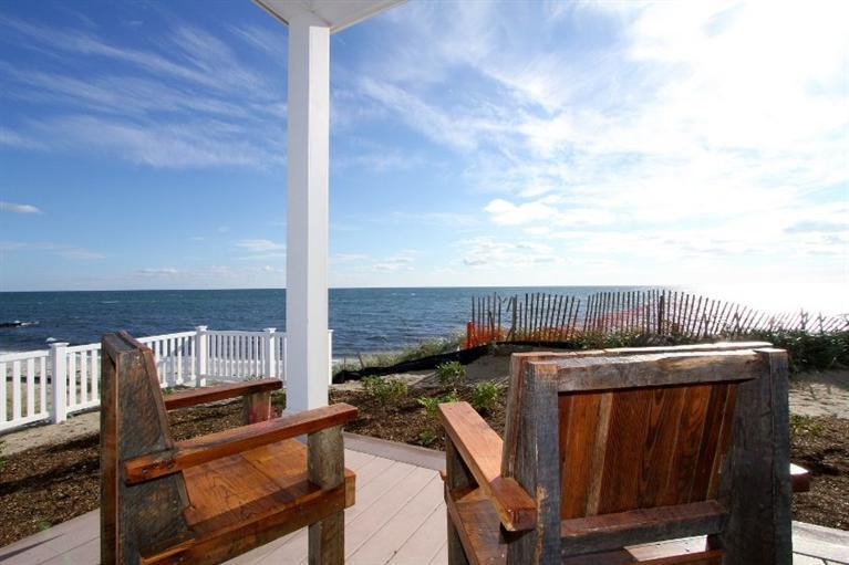 61 Old Wharf Road, Unit 1 Dennis Port, MA 02639 - Photo 18 of 34 a view of a balcony with furniture