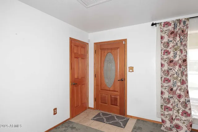 a view of a hallway with elevator