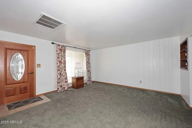 an empty room with windows