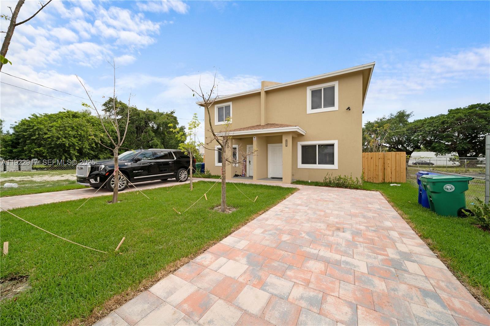 1770 Northwest 55th Street Miami, FL 33142 - Photo 1 of 21 a house view with a garden space