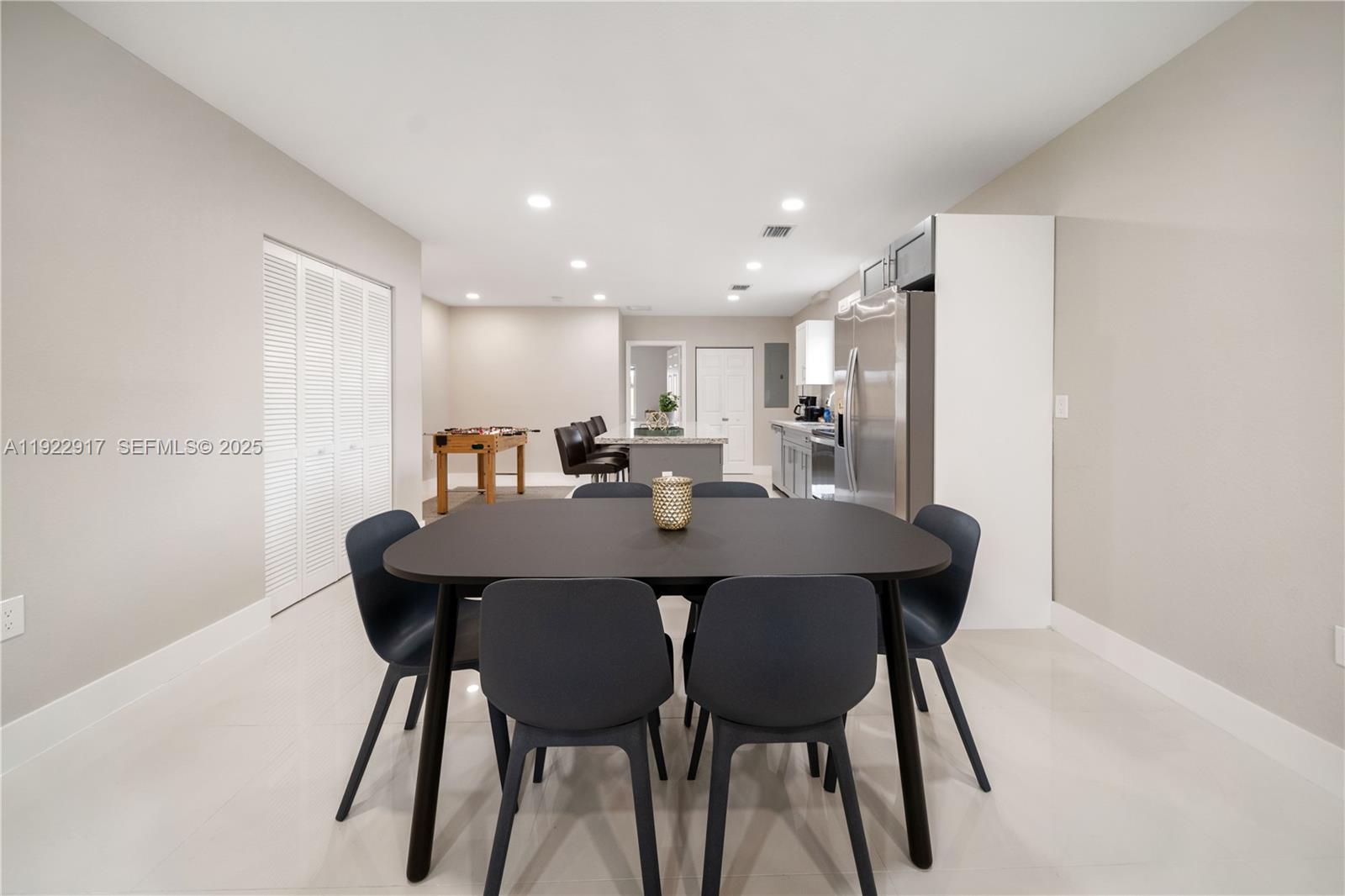 1770 Northwest 55th Street Miami, FL 33142 - Photo 12 of 21 a view of a dining room with furniture
