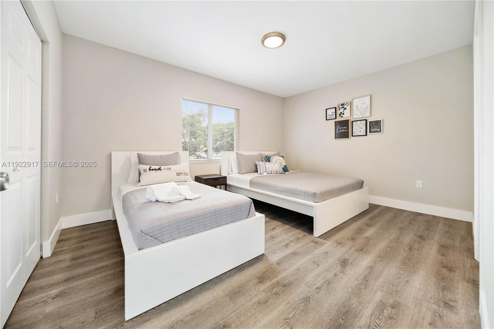 1770 Northwest 55th Street Miami, FL 33142 - Photo 14 of 21 a living room with furniture and a table