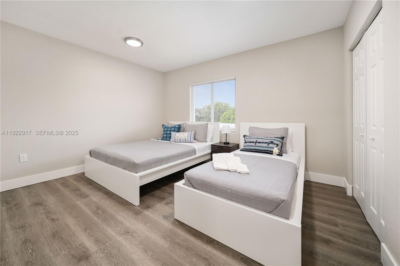 1770 Northwest 55th Street Miami, FL 33142 - Photo 18 of 21 a living room with furniture and a table