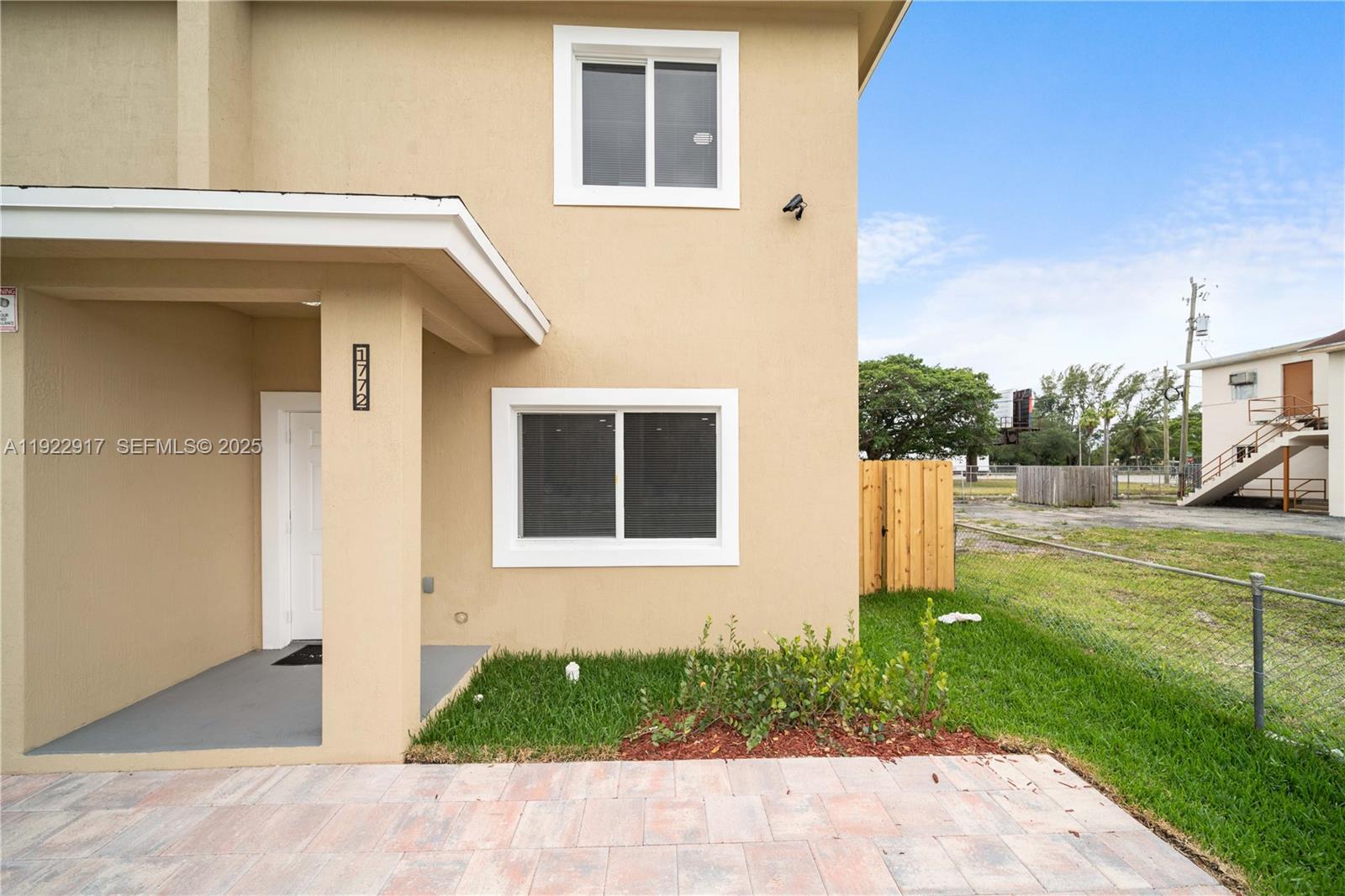 1770 Northwest 55th Street Miami, FL 33142 - Photo 2 of 21 a view of a house with a yard