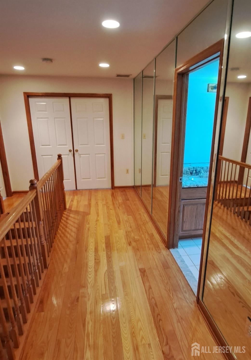 58 Bergen Mills Road Monroe Township, NJ 08831 - Photo 11 of 24 a view of an empty room with wooden floor and a window
