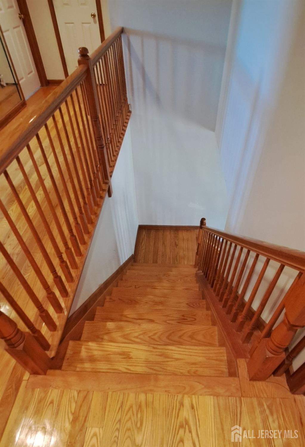 58 Bergen Mills Road Monroe Township, NJ 08831 - Photo 20 of 24 a view of wooden staircase