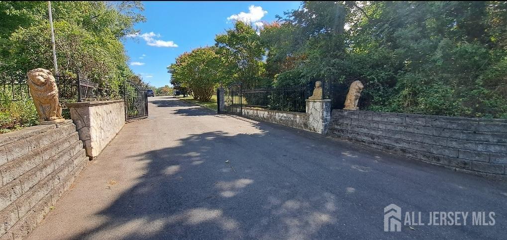 58 Bergen Mills Road Monroe Township, NJ 08831 - Photo 2 of 24 a view of a park that has large trees