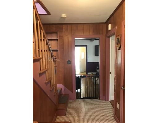 18 Prospect Street Ware, MA 01082 - Photo 13 of 33 a view of hallway with a large mirror and a window