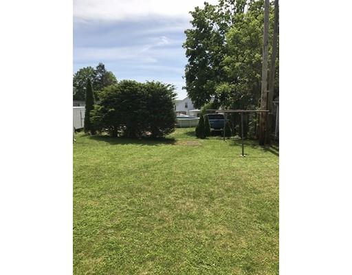 18 Prospect Street Ware, MA 01082 - Photo 5 of 33 a backyard of a house with lots of green space