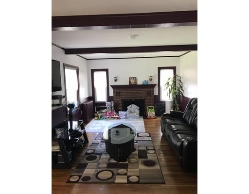 18 Prospect Street Ware, MA 01082 - Photo 8 of 33 a living room with furniture and a fireplace
