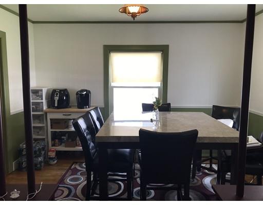 18 Prospect Street Ware, MA 01082 - Photo 10 of 33 a view of a dining room with a table and chairs