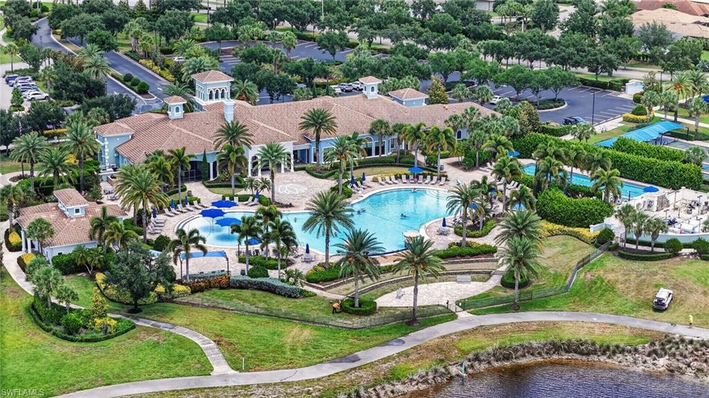 6124 Victory Drive Ave Maria, FL 34142 - Photo 44 of 50 an aerial view of residential houses with outdoor space and swimming pool