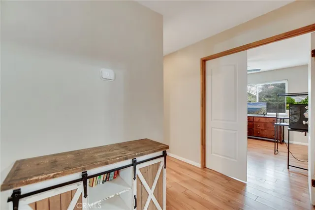 a view of livingroom with furniture and wooden floor