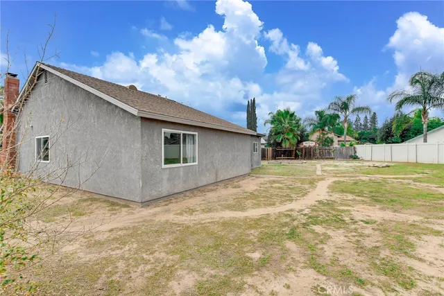 a view of backyard of house