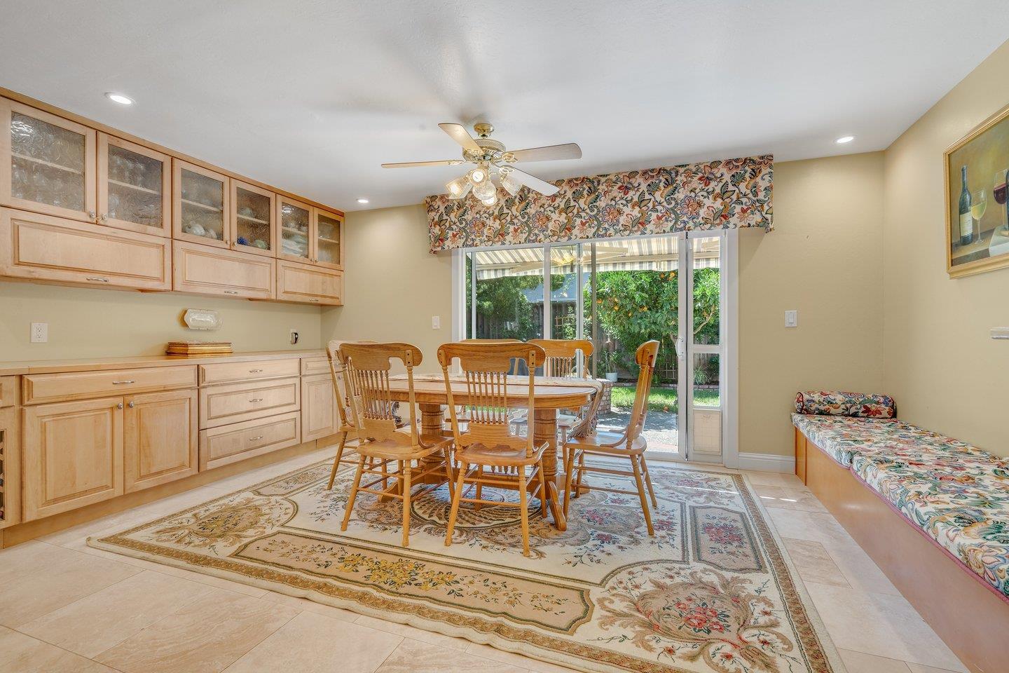 2289 Montezuma Drive Campbell, CA 95008 - Photo 16 of 46 a dining room with furniture a rug and wooden floor