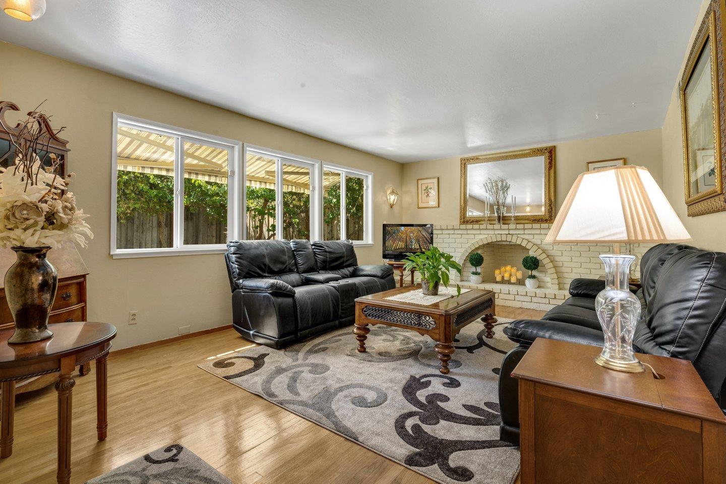 2289 Montezuma Drive Campbell, CA 95008 - Photo 18 of 46 a living room with furniture and a window