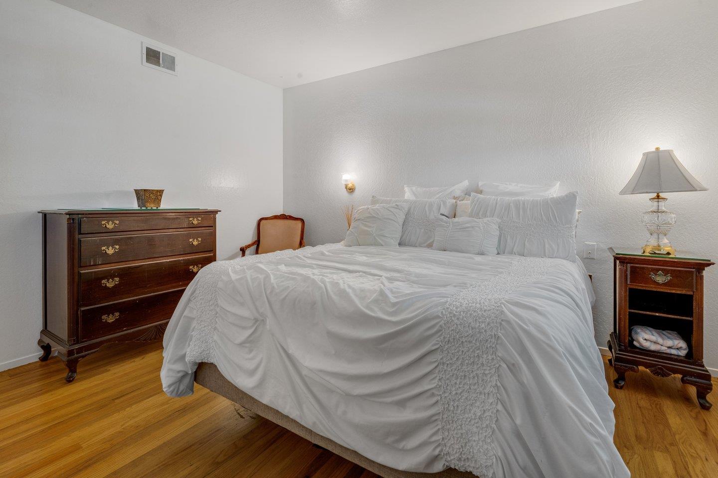 2289 Montezuma Drive Campbell, CA 95008 - Photo 22 of 46 a bedroom with a bed and a dresser