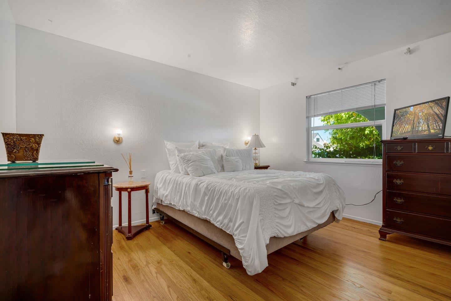 2289 Montezuma Drive Campbell, CA 95008 - Photo 23 of 46 a bedroom with a bed and a dresser