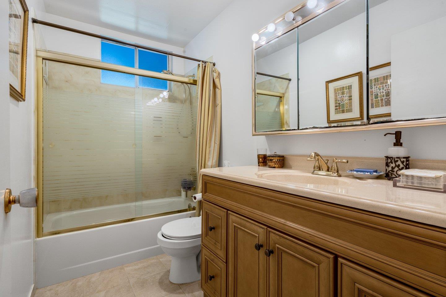 2289 Montezuma Drive Campbell, CA 95008 - Photo 24 of 46 a bathroom with a sink a toilet and shower
