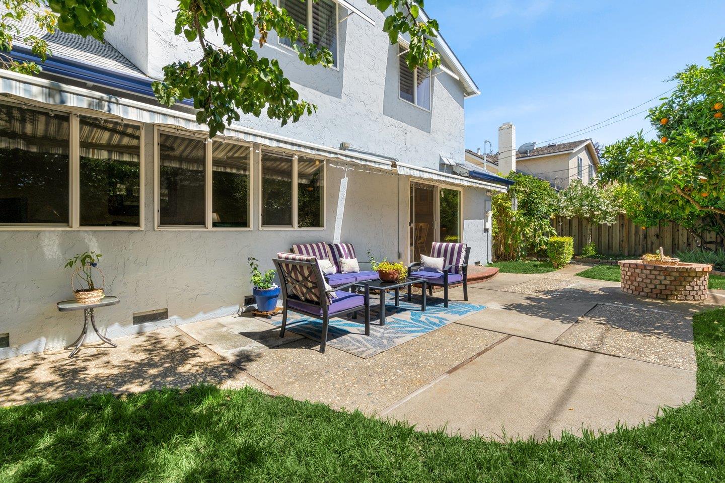 2289 Montezuma Drive Campbell, CA 95008 - Photo 39 of 46 a view of a backyard with table and chairs and potted plants
